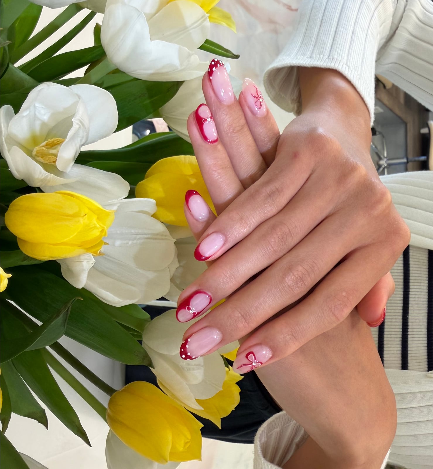 Red French manicure at Sunblessed Nails Studio in Los Angeles